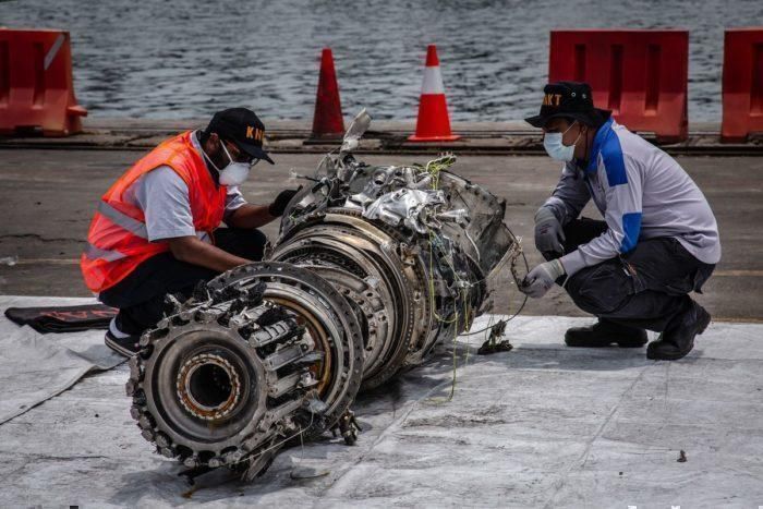 Investigators inspecting Lion Air wreckage