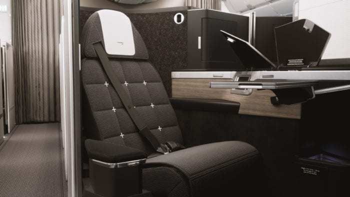 British Airways Club Suite seat with three-point seatbelt design.