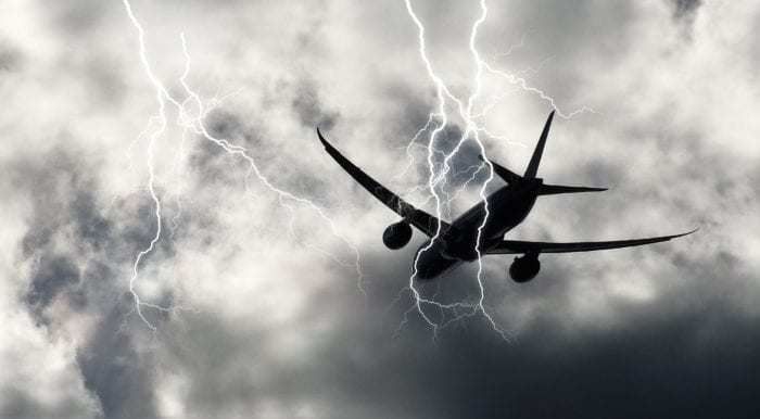 Aircraft flying through a storm cloud.