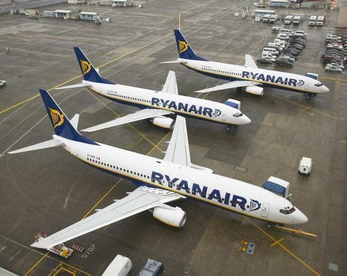 3 Ryanair airlines on apron of airport