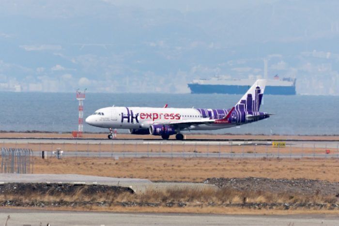 An HK Express jet on the runway at Hong Kong