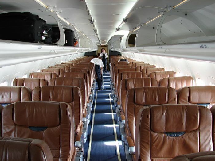 The interior of a Midwest Express Airlines Boeing 717