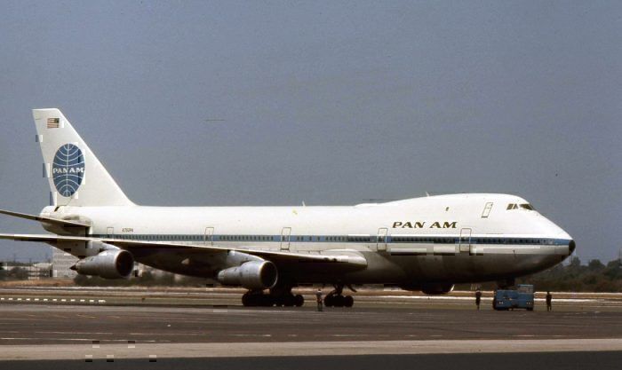 A Pan Am Boeing 747 parked at an airfield.