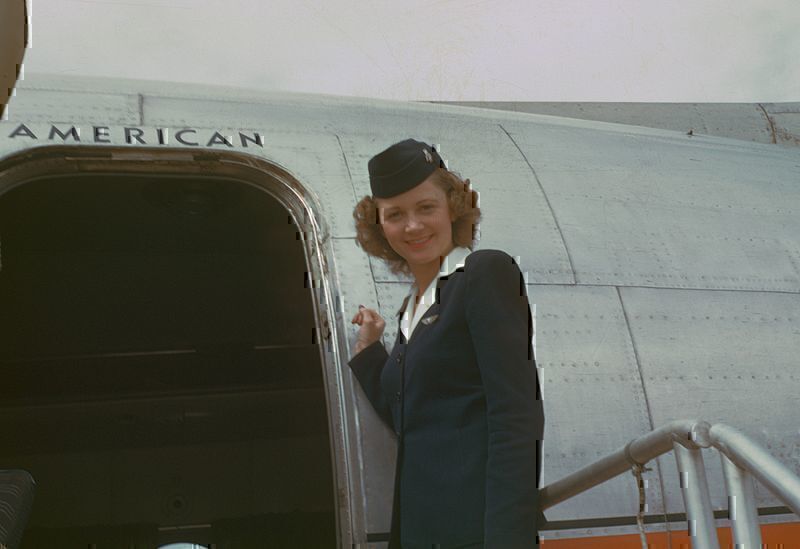 800px-Stewardess,_circa_1949-50,_American_Overseas,_Flaghip_Denmark,_Boeing_377_Stratocruiser