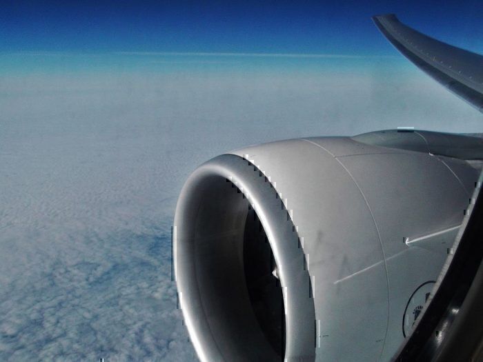 GE90 jet engine from aircraft window in flight