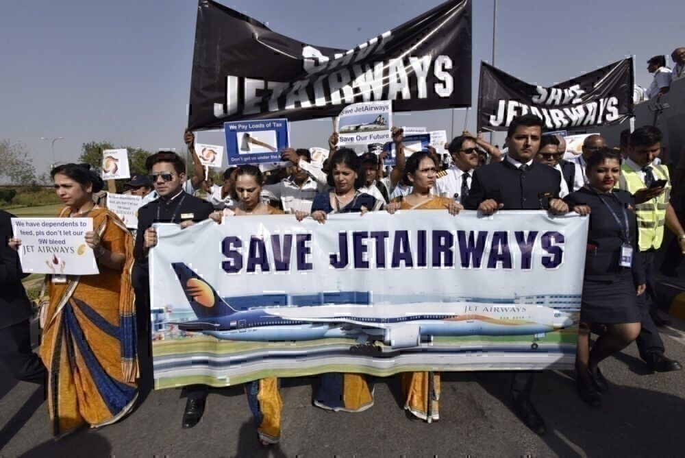 Jet Airways' employees protest outside IGI Airport over delay in their salaries, on April 13, 2019 in New Delhi, India. (Photo by Sanjeev Verma/Hindustan Times via Getty Images)