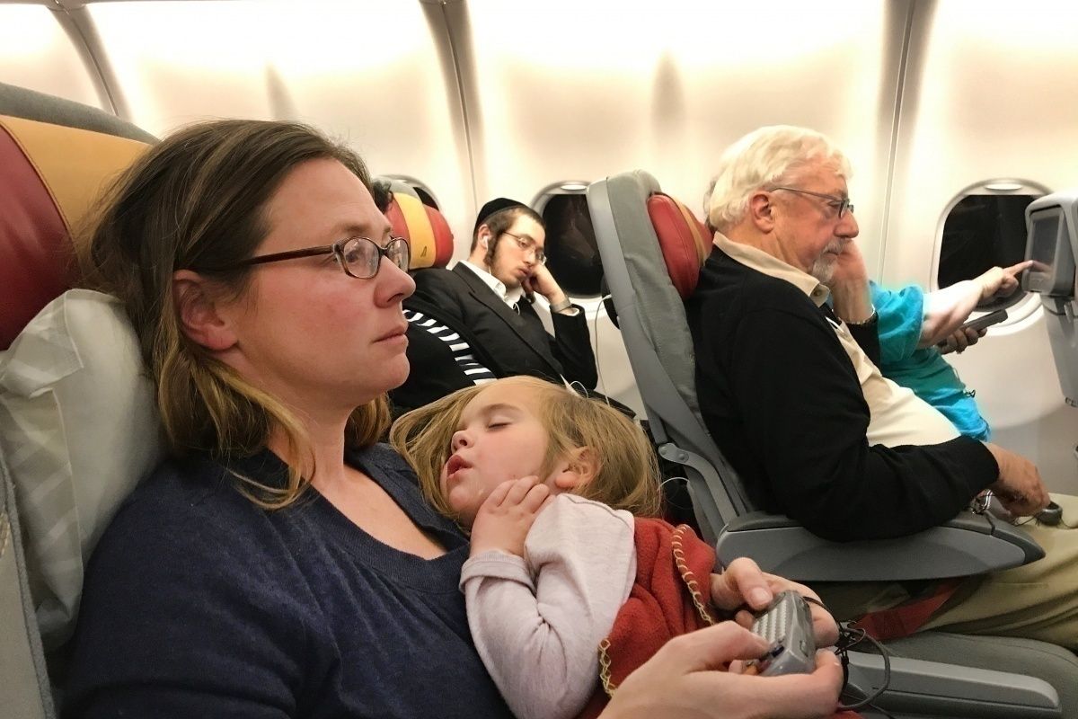 Mom and daughter on plane