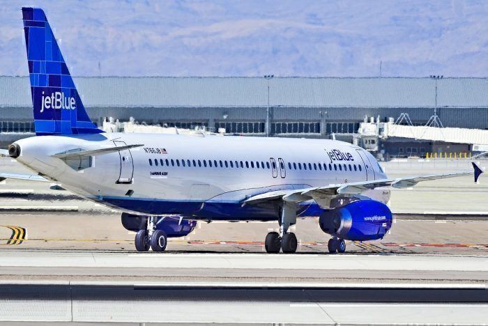 JetBlue taxiing on runways