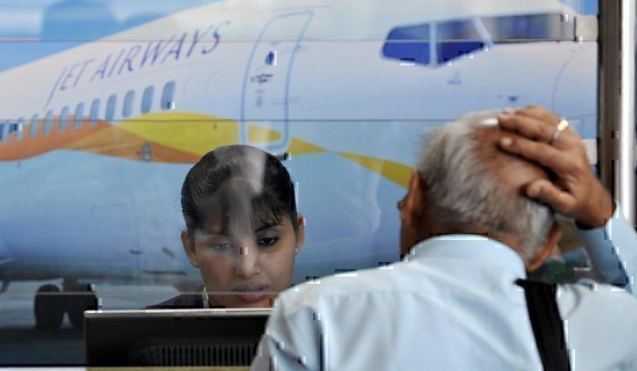 Passengers reacting at Jet Airwasy counter