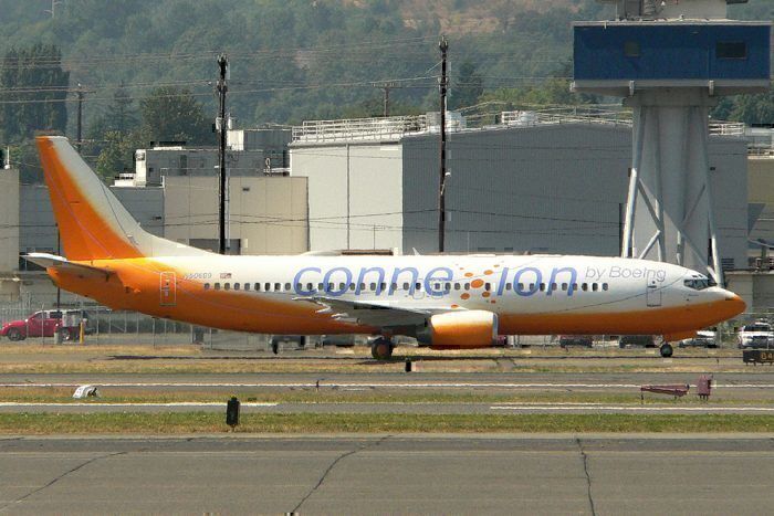A Boeing Connexion 737 test aircraft sitting on a runway.