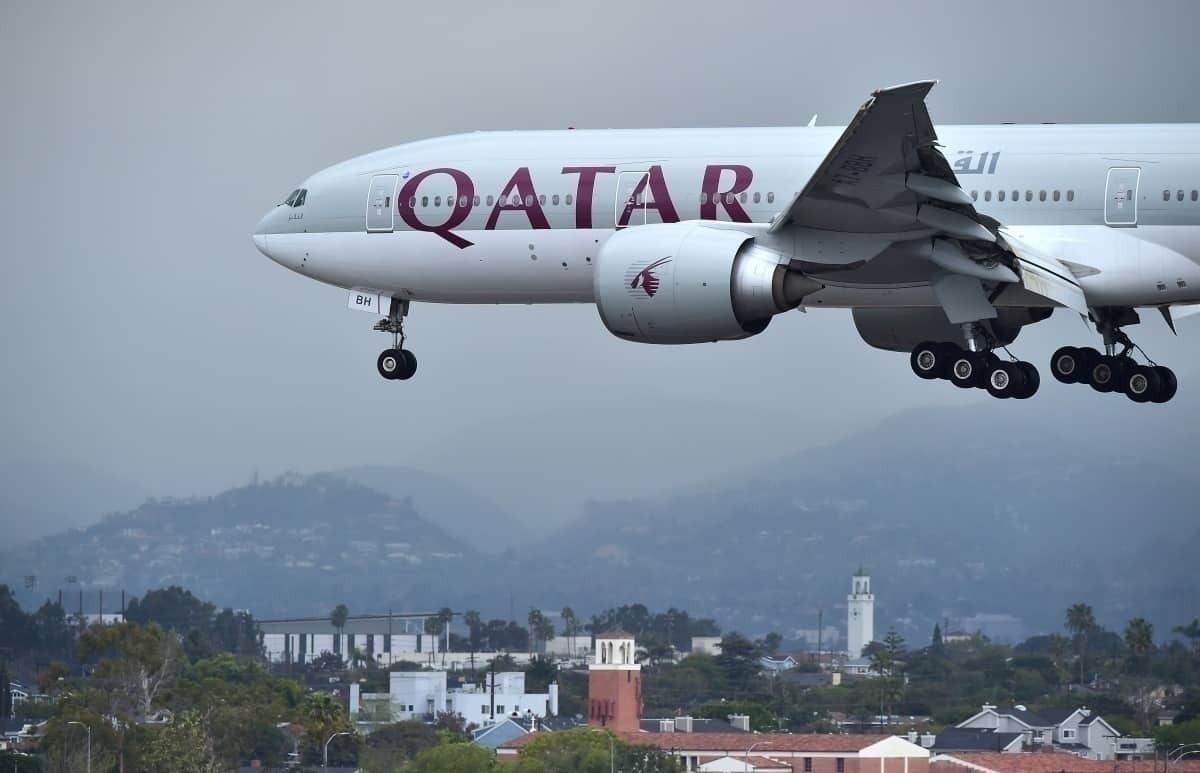 Qatar Airways flying over Doha