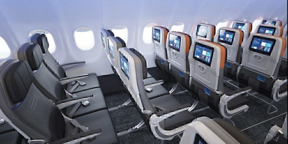 JetBlue cabin focusing on the seatback entertainment screens.