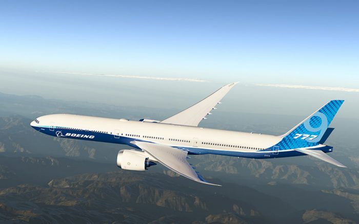 A Boeing 777X Flying in the sky.