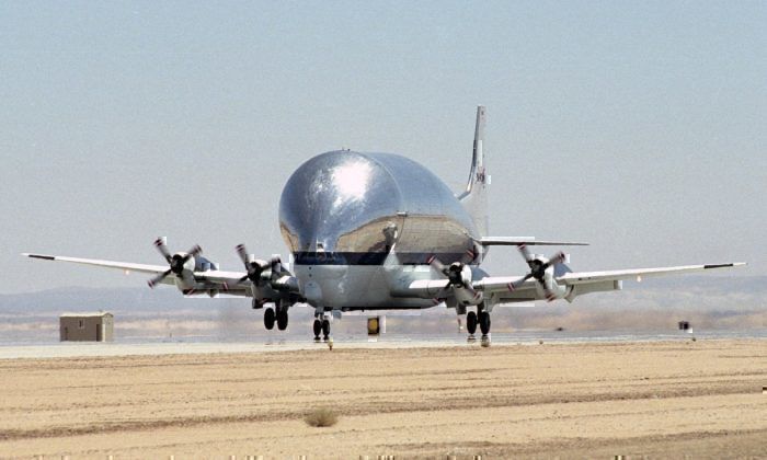 NASA's Super Guppy rolling down the runway.