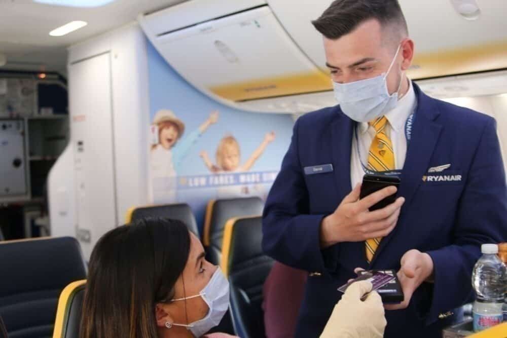 in-flight service, cabin crew with mask, passenger with mask