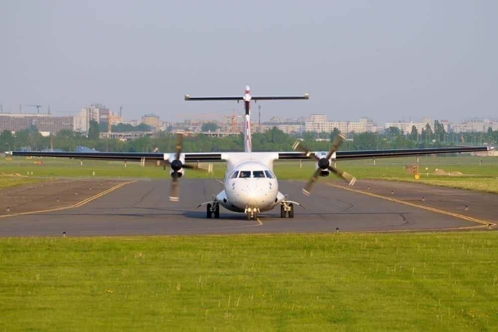 An ATR turboprop taxiing to the runway.