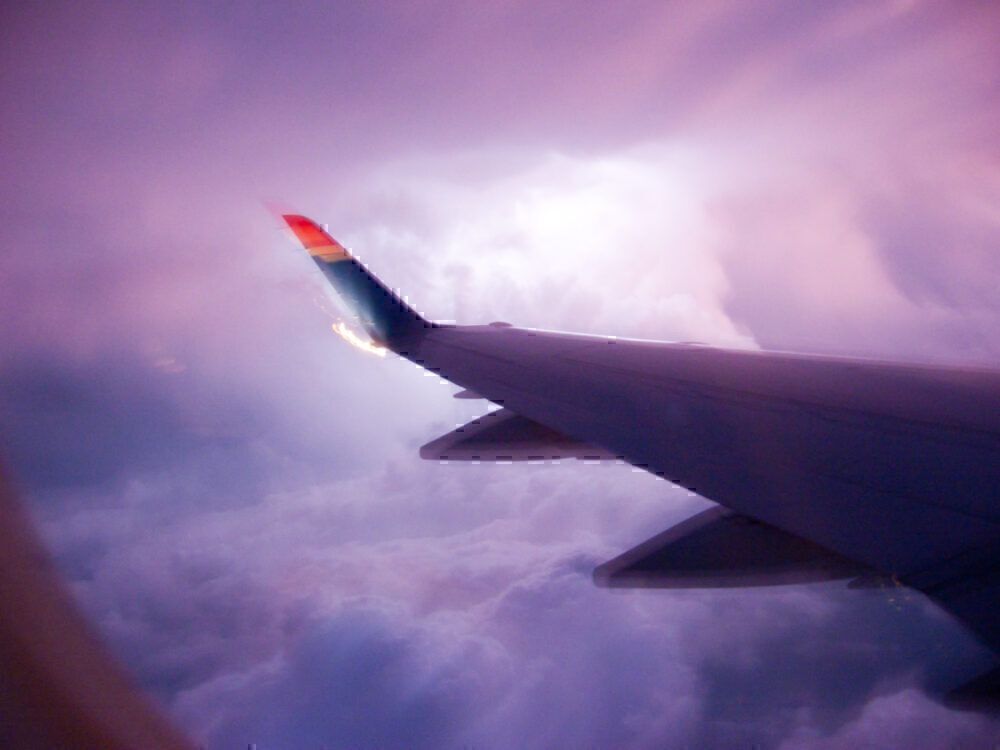 Aircraft wing in thunderstorm