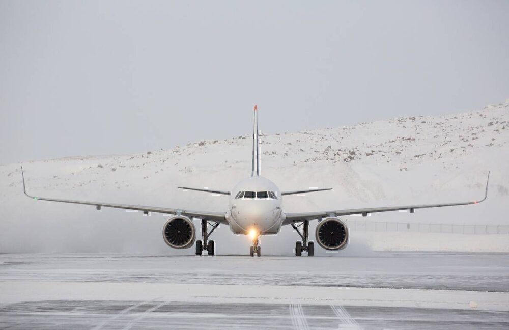 An Airbus A320neo in the snow. 