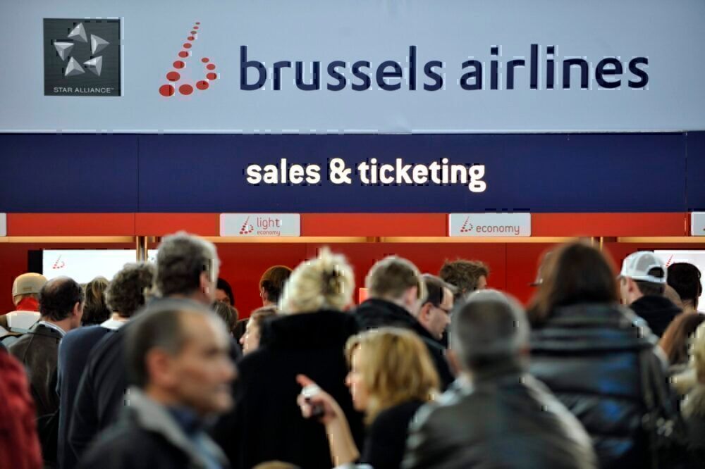 People in line at sales and ticketing queue, Brussels Airlines