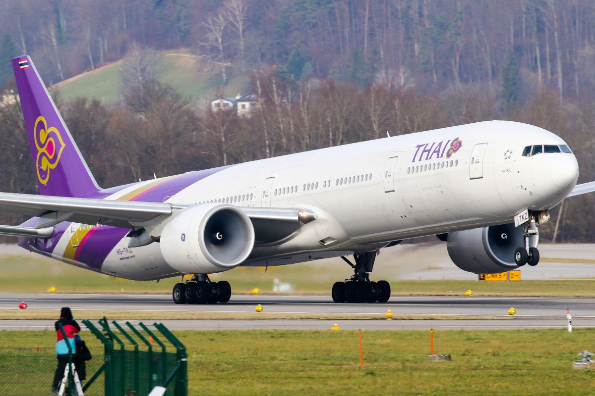 777-300ER aircraft departing from Zurich