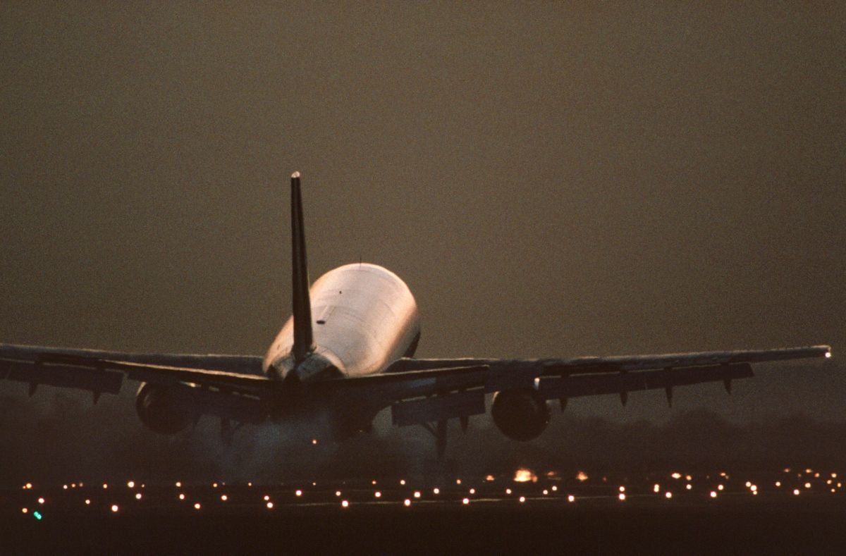 Airbus A300B4 landing at dusk