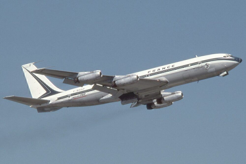 An Air France Boeing 707 Flying in the sky.