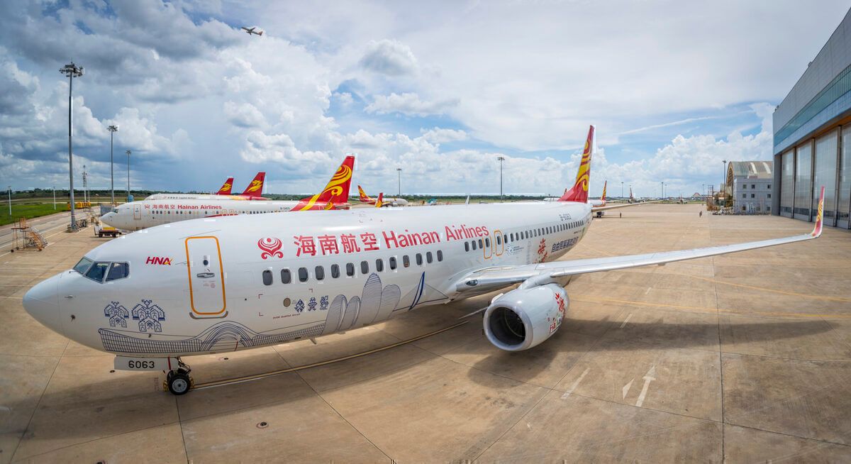 Boeing 737 aircraft of Hainan Airlines with the theme of Hainan Free Trade Port sits parked at Haikou Meilan International Airport on August 12, 2020