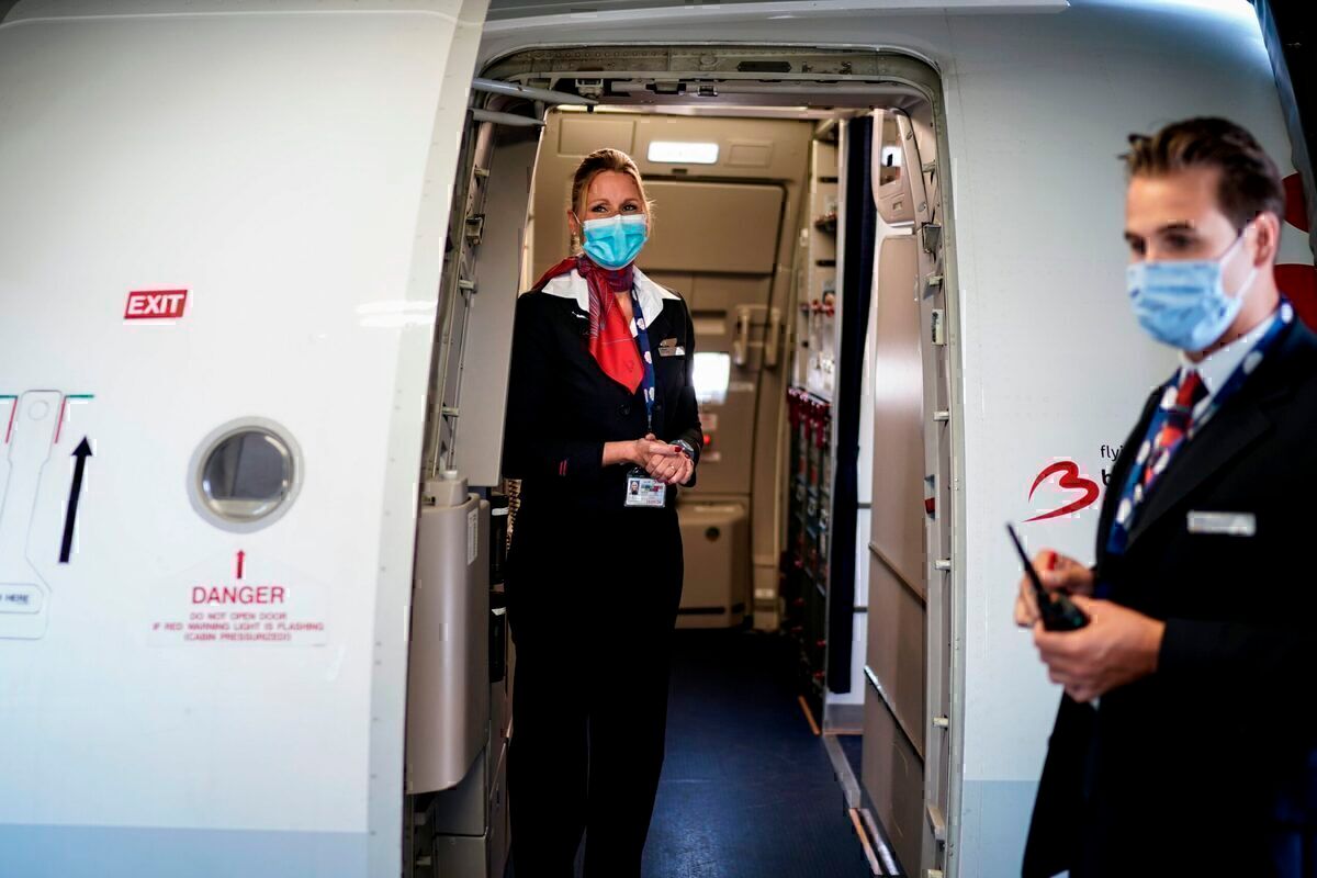 can you board a plane with covid symptoms