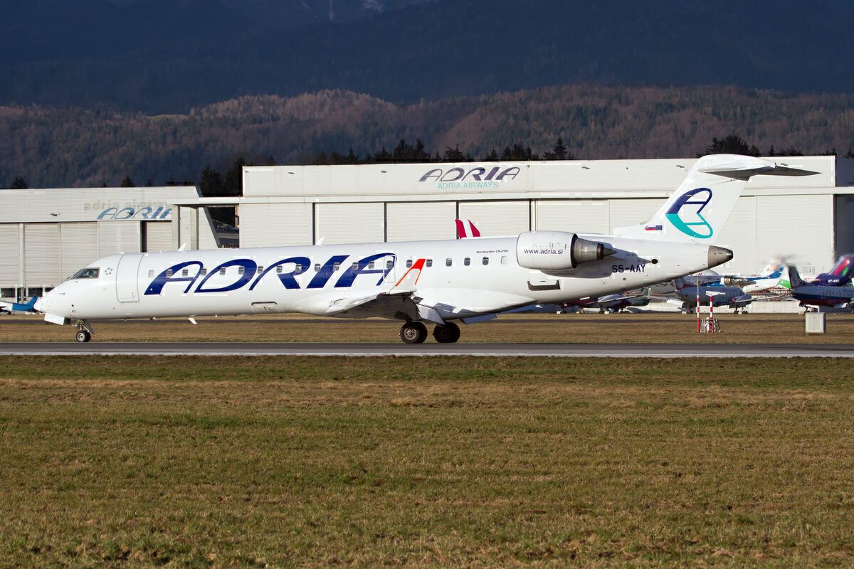 Adria Airways CRJ-700 on the runway
