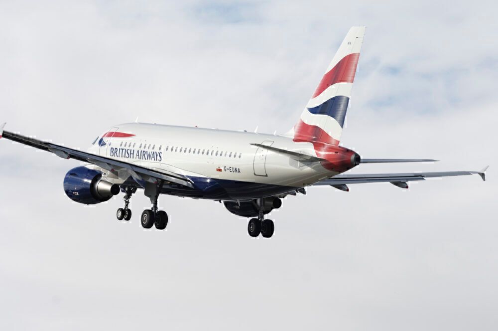 British Airways Airbus A318-100 climbing out after take-off