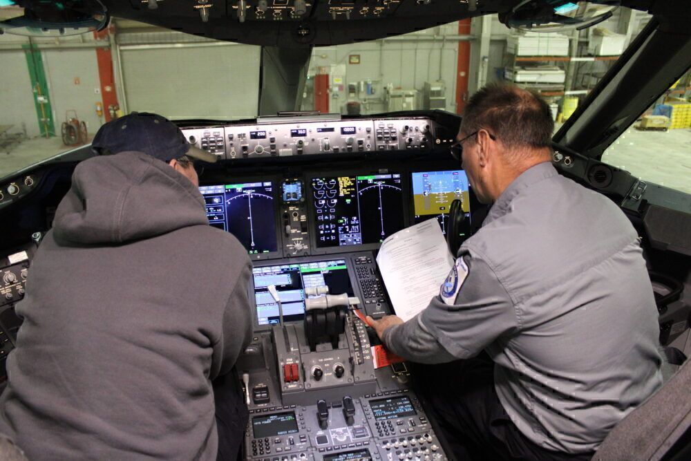 Technicians in cockpit
