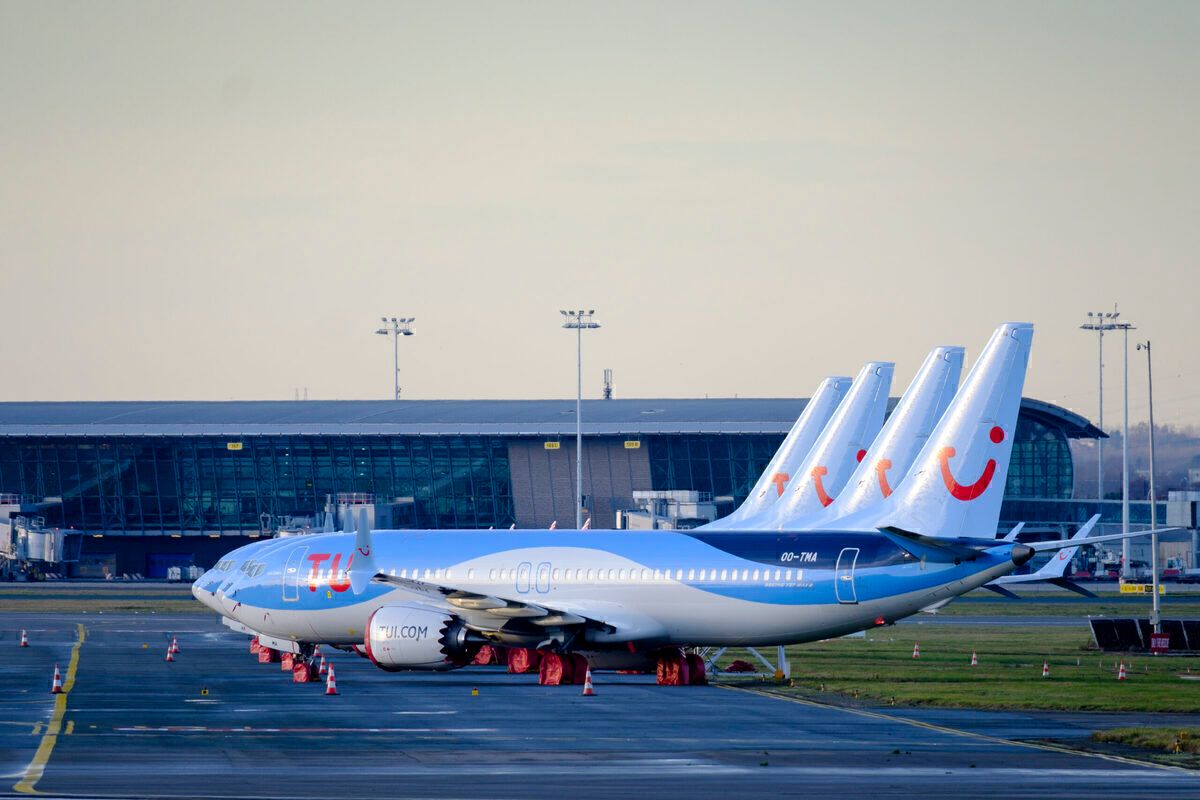 BRUSSELS, BELGIUM - DECEMBER 18: 4 Boeing 737 MAX from TUI fly Belgium are docked in Brussels on December 18, 2019. On December 16, 2019, Boeing announced: 'Safely returning the 737 MAX to service is our top priority. We know that the process of approving the 737 MAX's return to service, and of determining appropriate training requirements, must be extraordinarily thorough and robust, to ensure that our regulators, customers, and the flying public have confidence in the 737 MAX updates. As we ha
