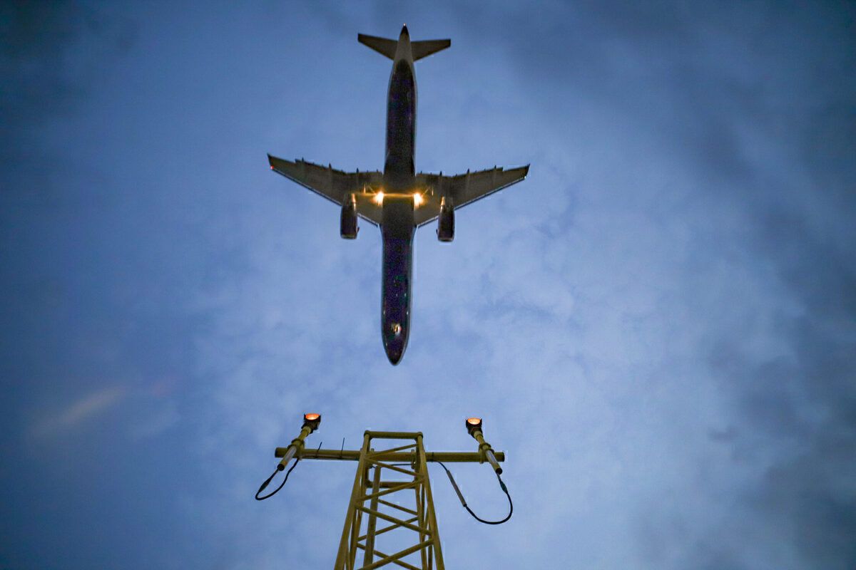 Aircraft landing at dusk Heathrow