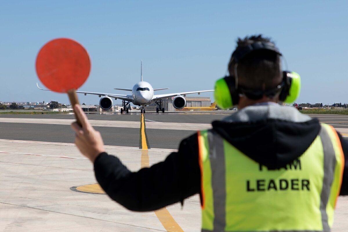 A Lufthansa Airbus A350 being marshalled in Malta