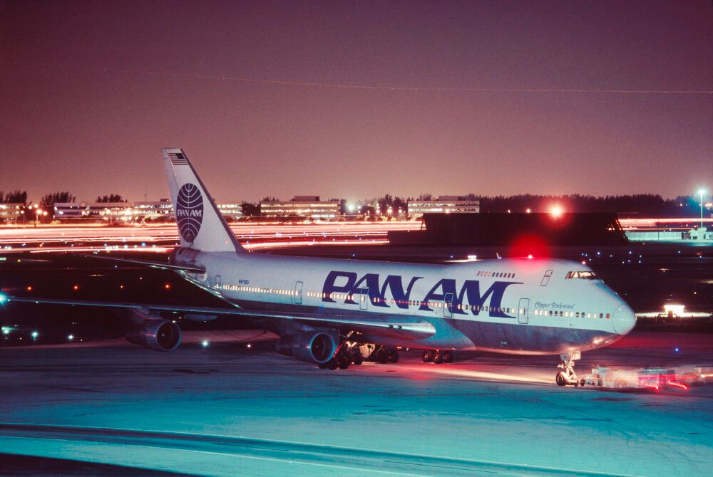 Pan Am Boeing 747-100 being pushed-back by a tug at night