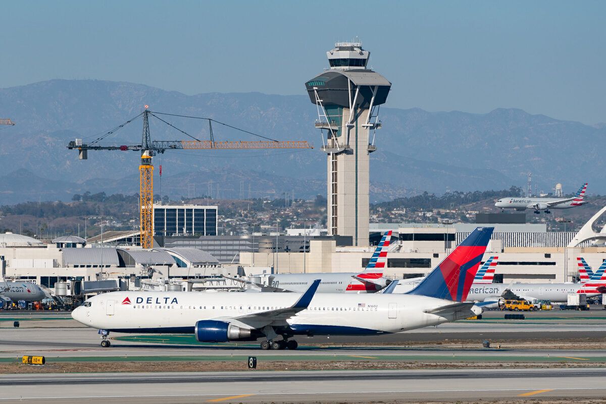 Los Angeles airport with a delta plane in the foreground