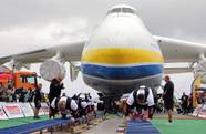 Impressive 8 Men Set Record Pulling The World s Heaviest Plane
