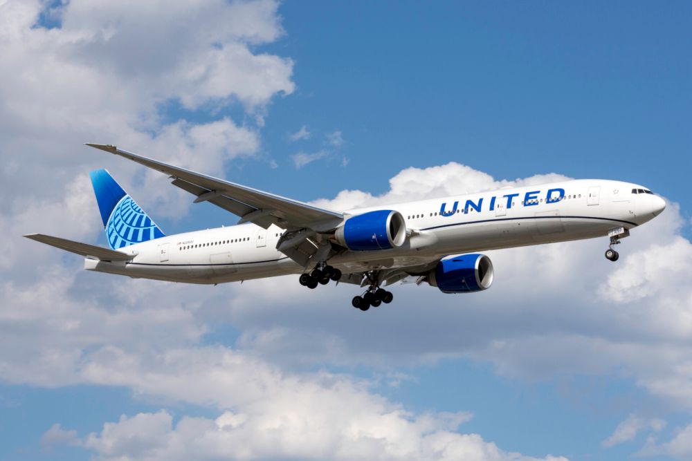 a United 777-300ER coming in for landing.