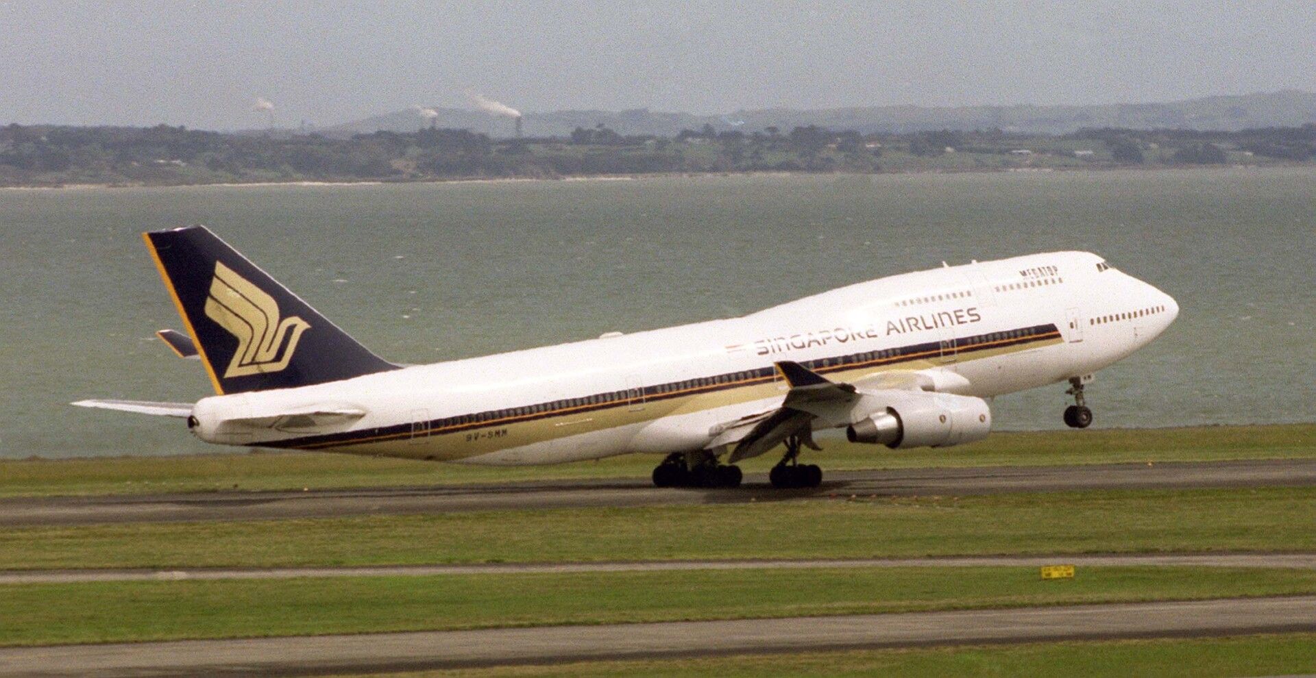 A Singapore Airlines Boeing 747 400 takes off from