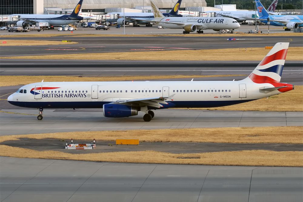 A British Airways Airbus A321-200, registration G-MEDN, on the taxiway.