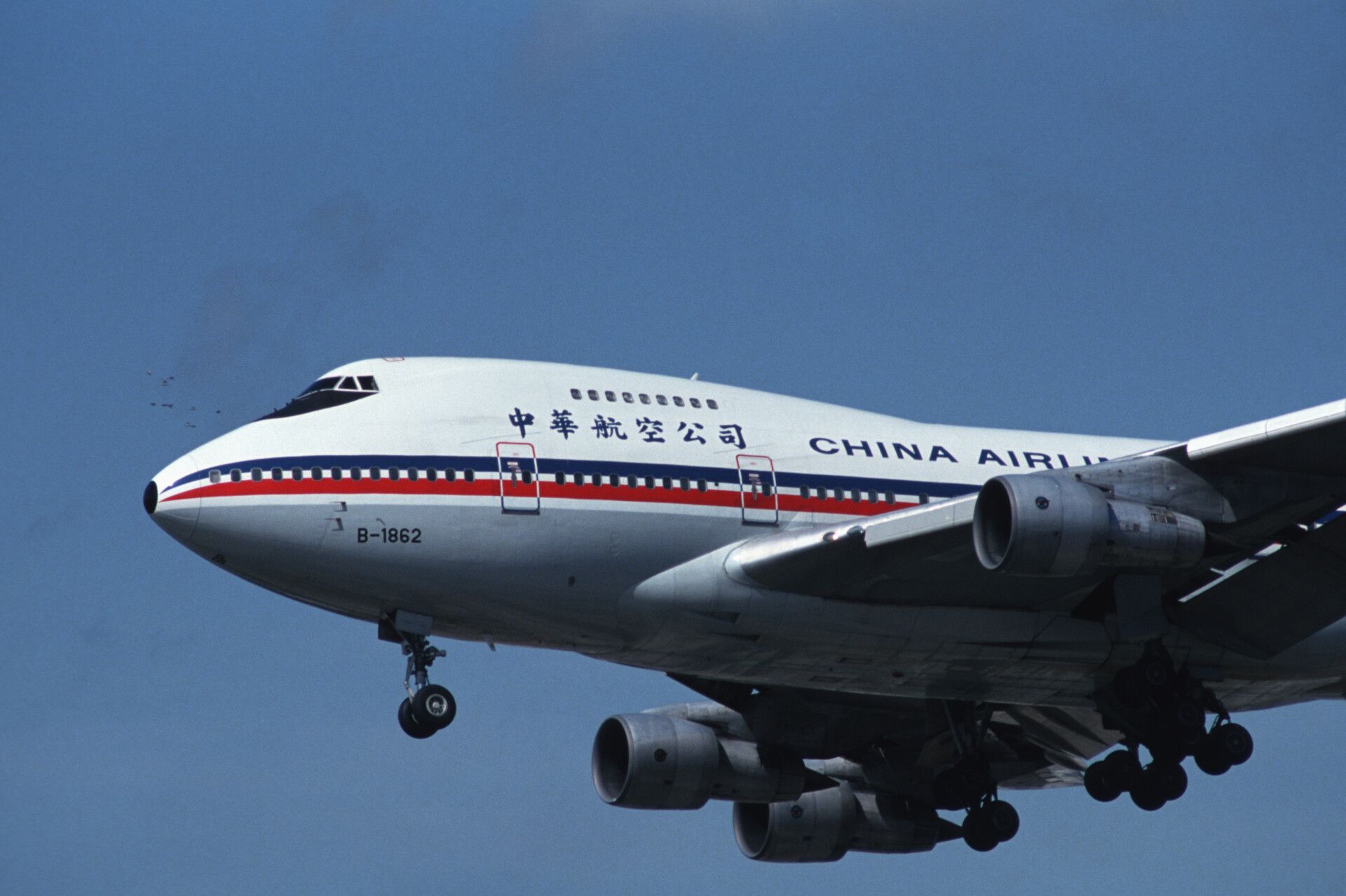 A China Airlines Boeing 747 lands at Kai Tak airport in