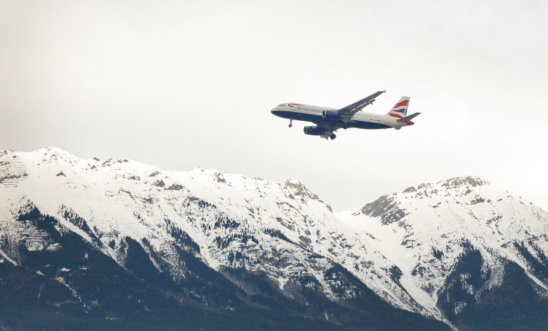 Austrian mountains overflown by a British Airways aircraft