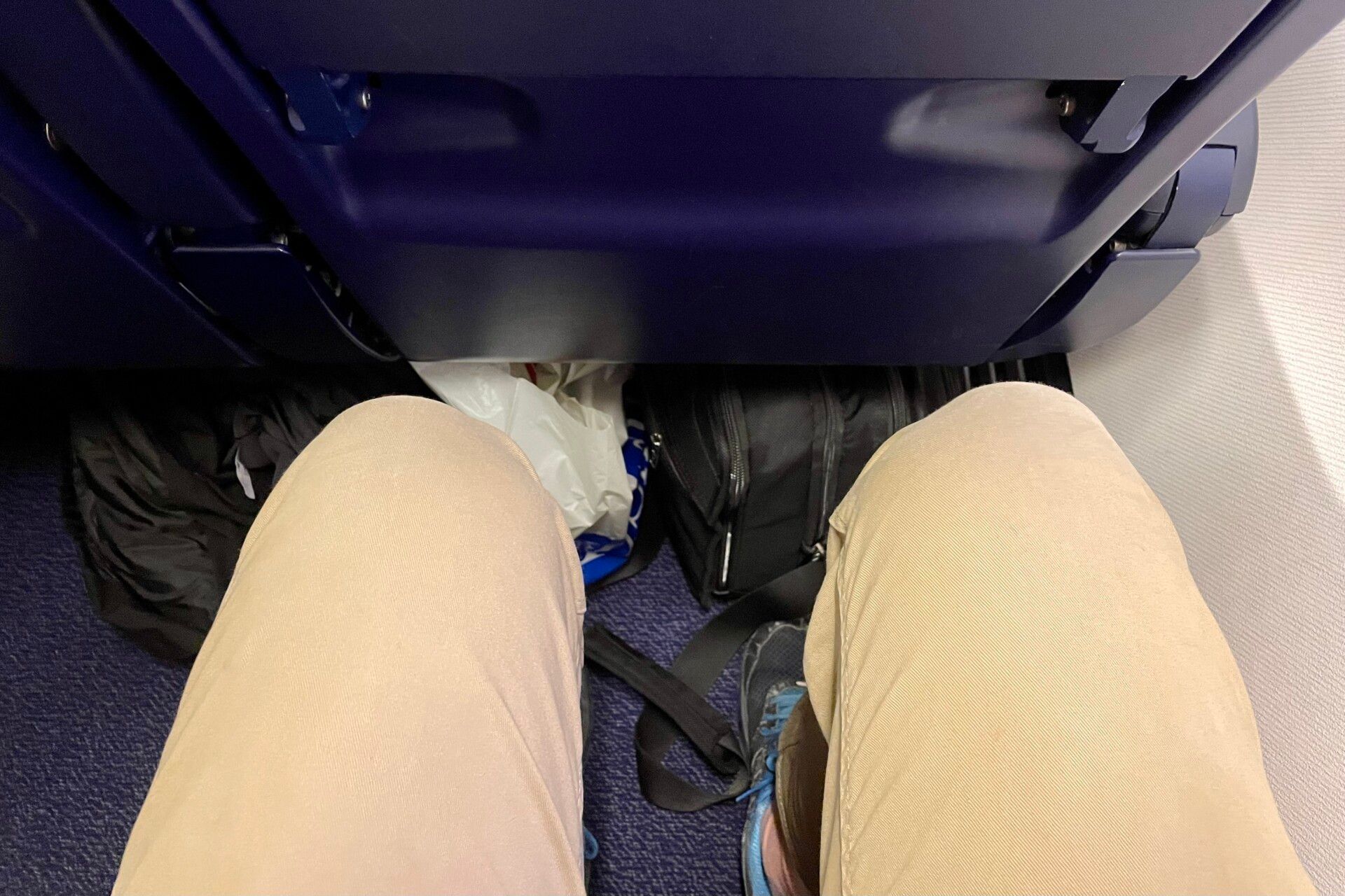 A photo inside the Ryanair aircraft cabin, showing seat pitch.