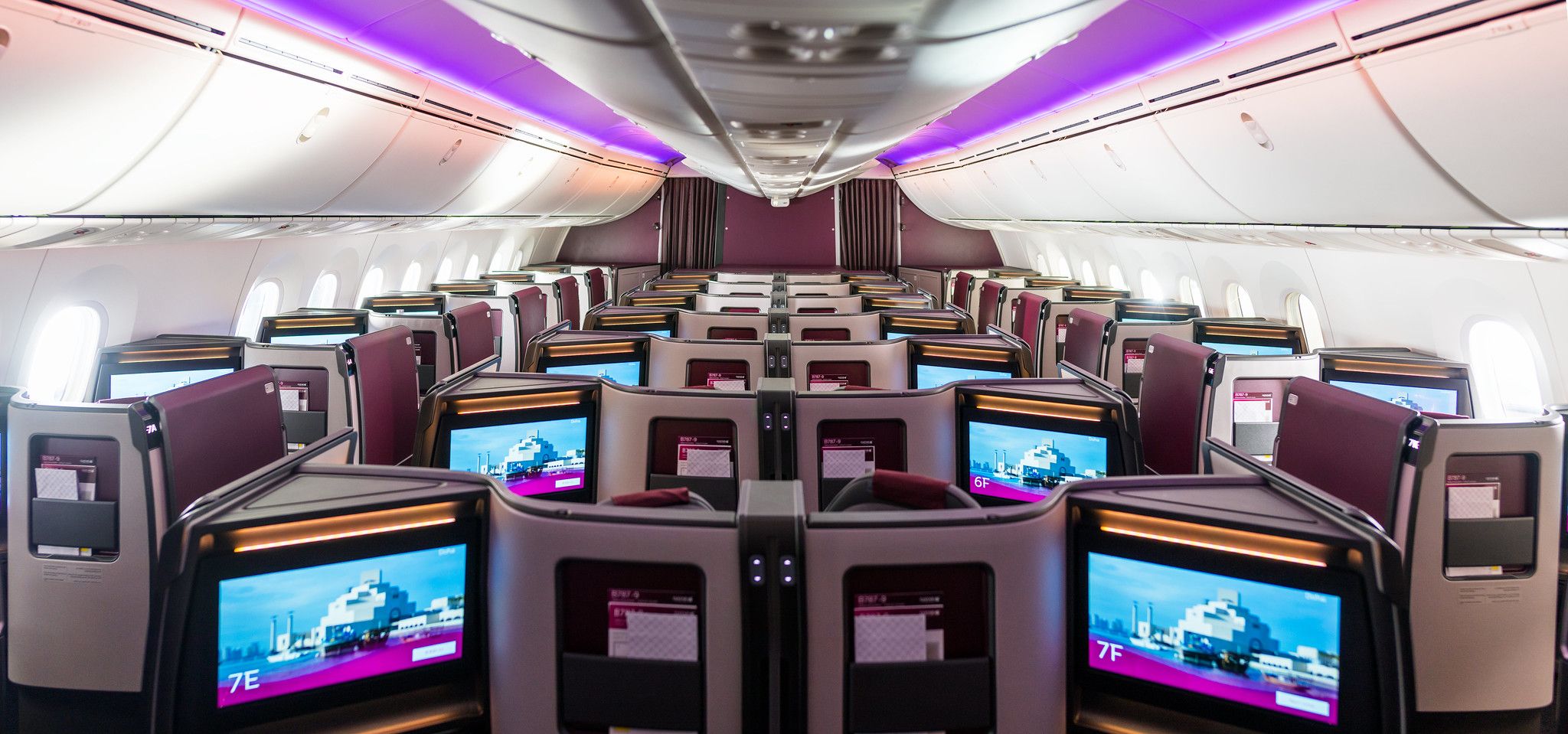 A panoramic view of the business class QSuite cabin on Qatar Airways Airbus A350.