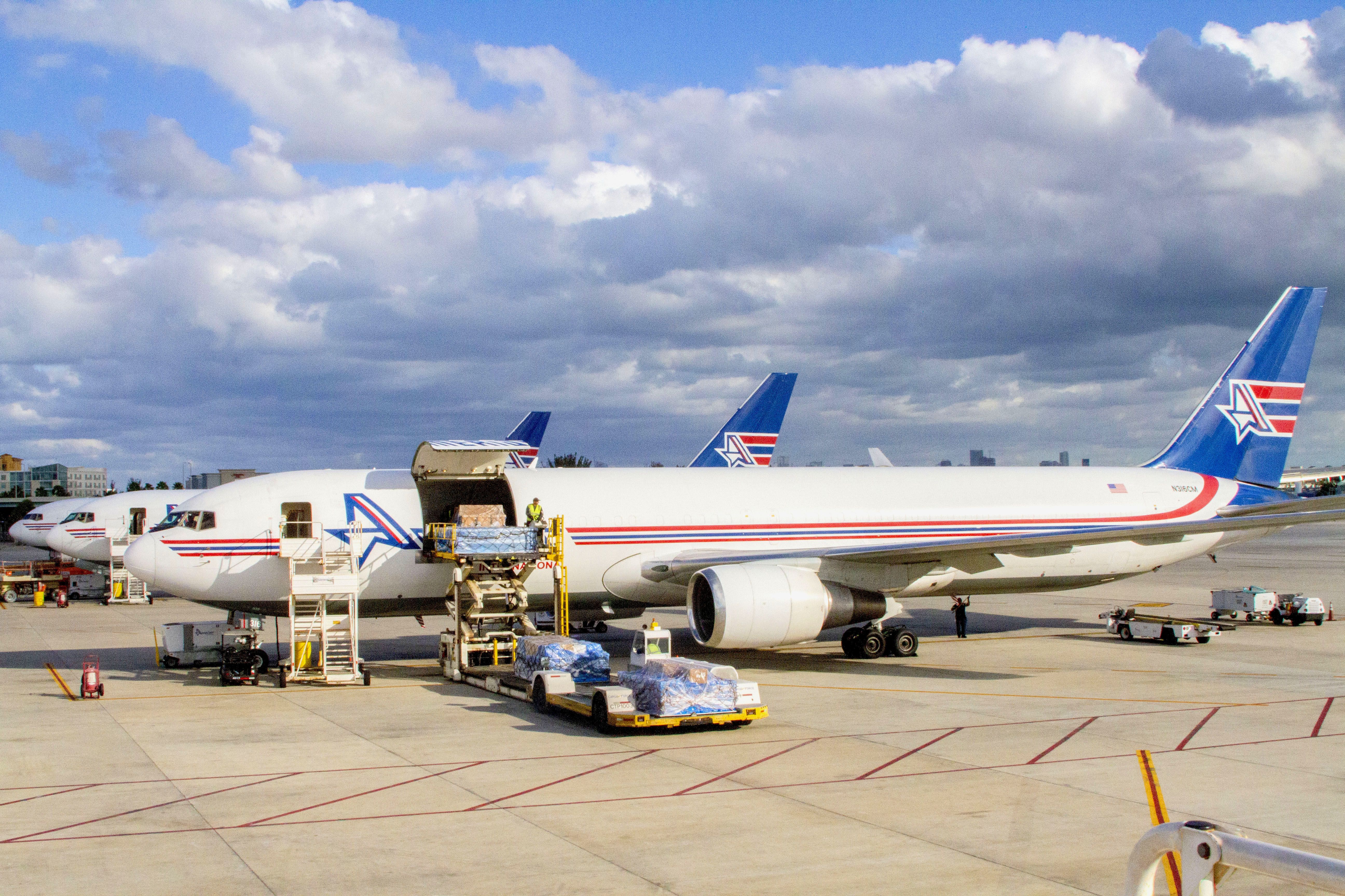 An Amerijet aircraft being filled with cargo.