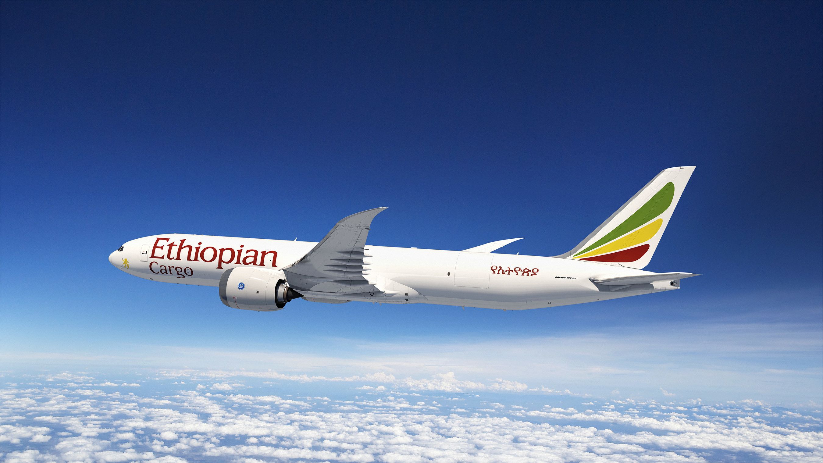 A render of an Ethiopian Airlines Boeing 777-8F flying above the clouds.