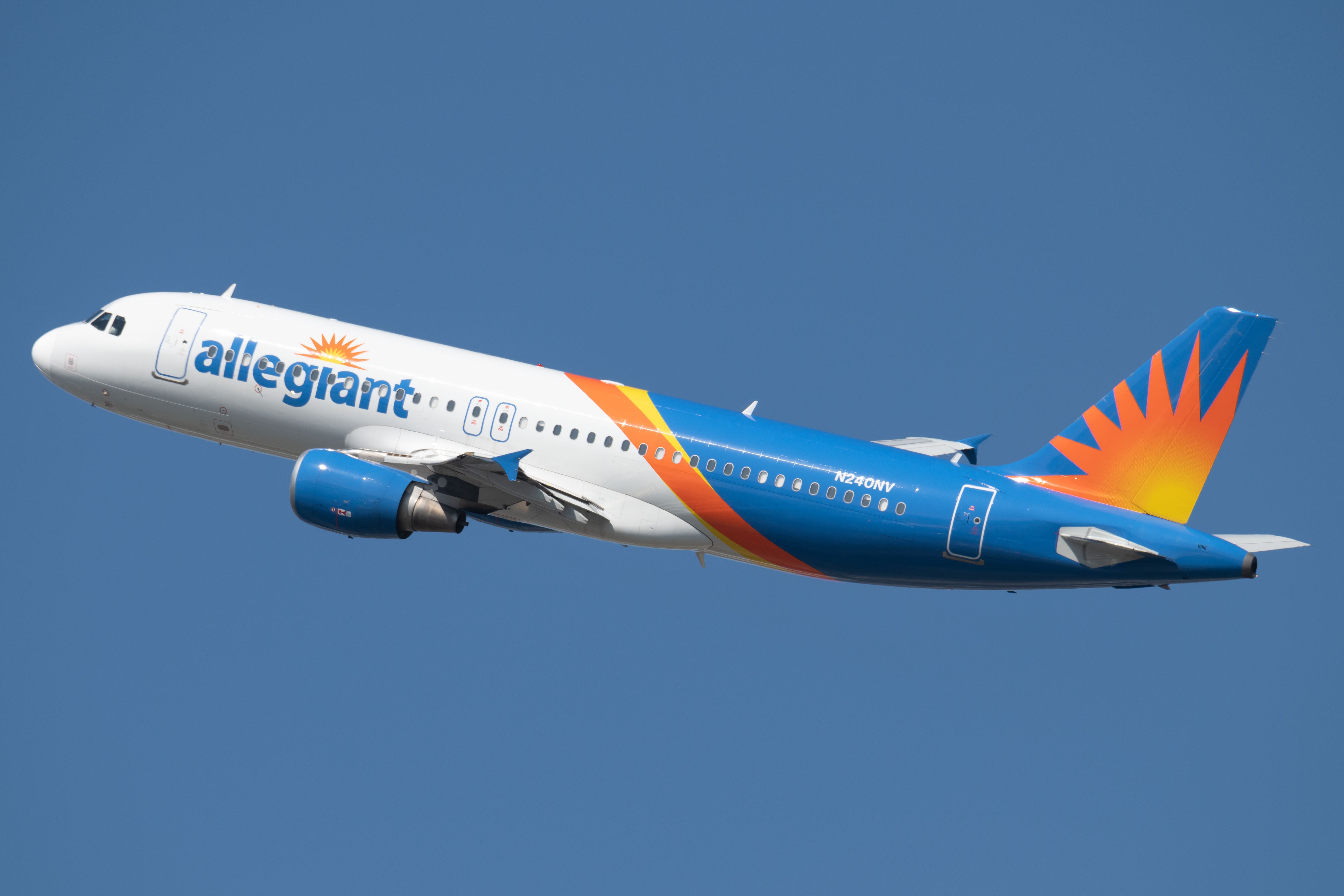 An Allegiant Air Airbus A320-200 flying in the sky.