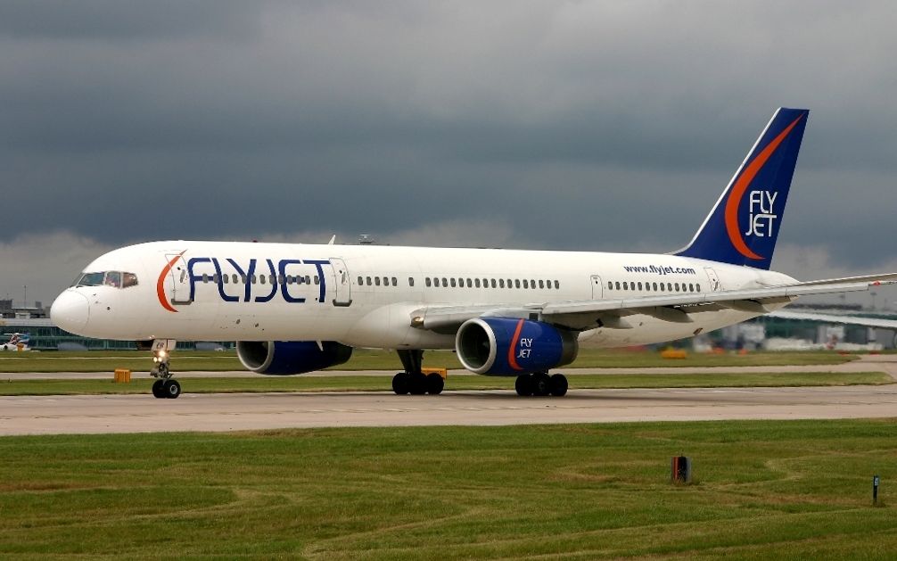 A Flyjet Boeing 757 on an airport apron.