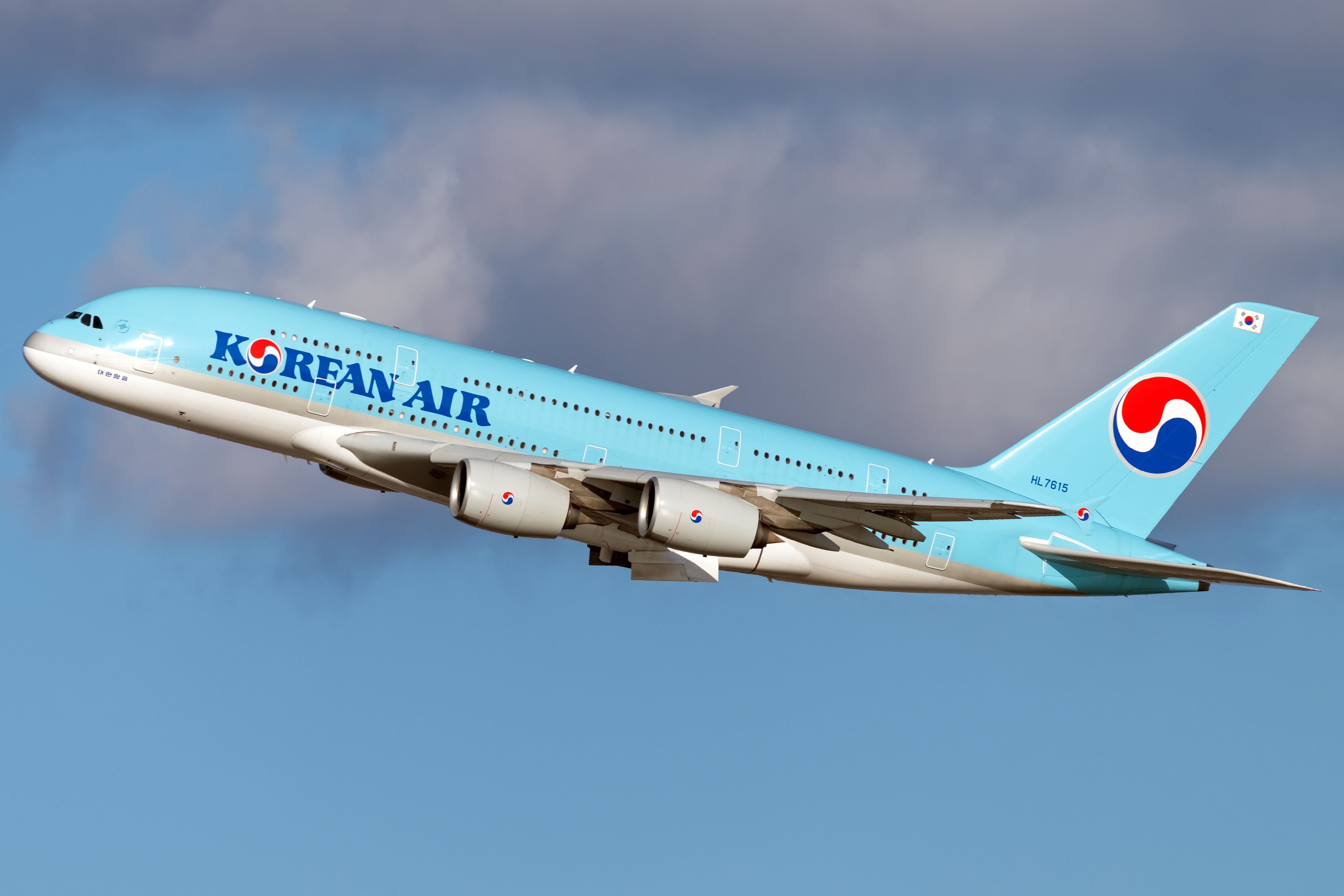 A Korean Air Airbus A380-861 Flying in the sky.