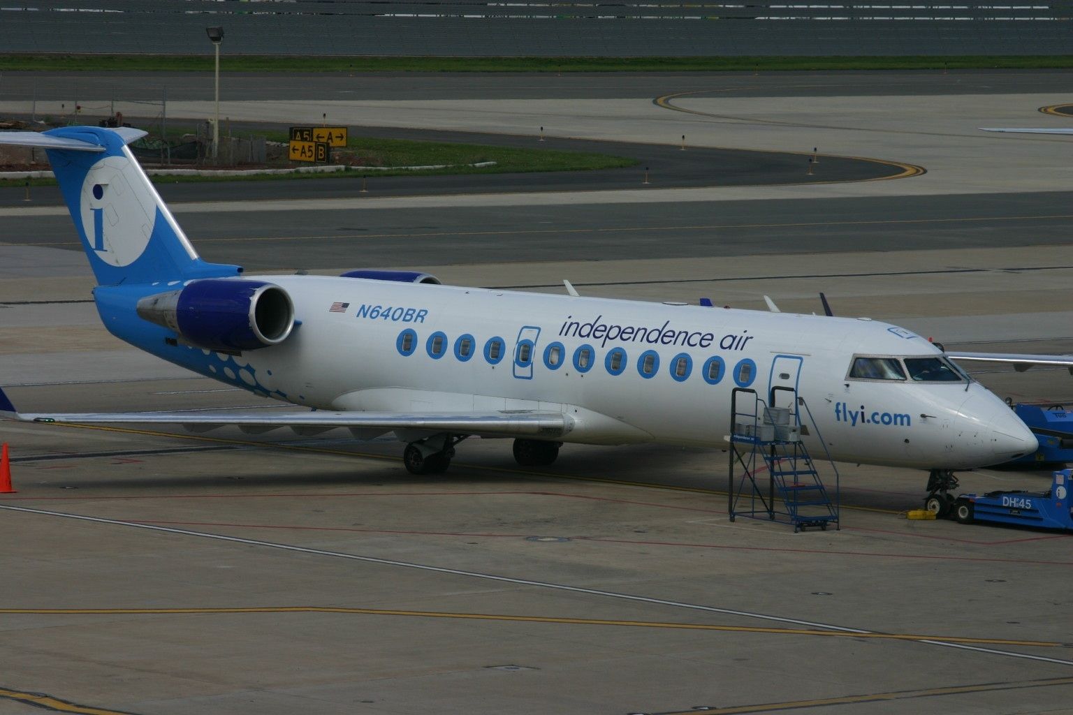 Independence Air CRJ-200 parked at the airport